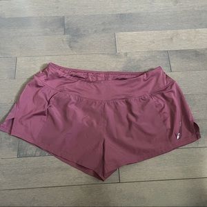 pink nike running shorts